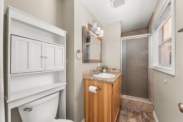 1718 S Bolivar Rd, Spokane Valley, WA 99037 - bathroom with vanity, a shower stall, and stone finish flooring