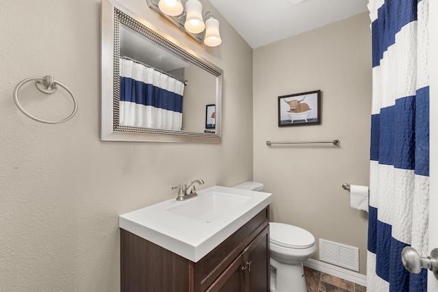 1718 S Bolivar Rd, Spokane Valley, WA 99037 - bathroom with vanity and toilet