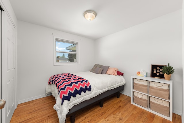 1718 S Bolivar Rd, Spokane Valley, WA 99037 - bedroom with light wood finished floors and a closet