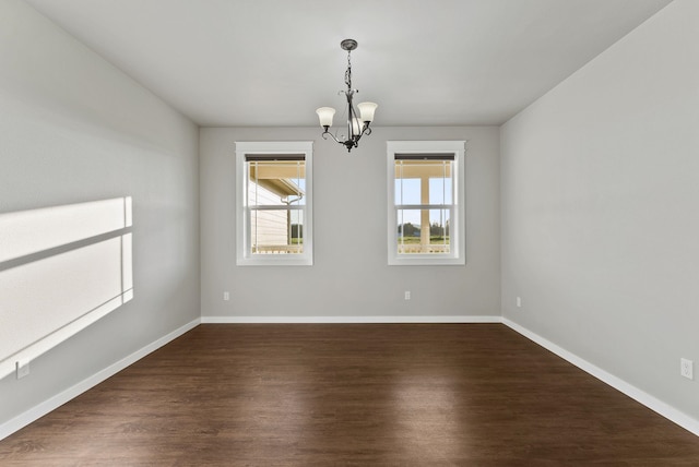 37818 N Grove Rd, Deer Park, WA 99006 - empty room with dark wood-type flooring and a chandelier