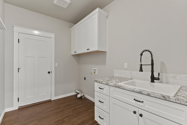 37818 N Grove Rd, Deer Park, WA 99006 - laundry room with washer hookup, electric dryer hookup, cabinet space, and dark wood finished floors