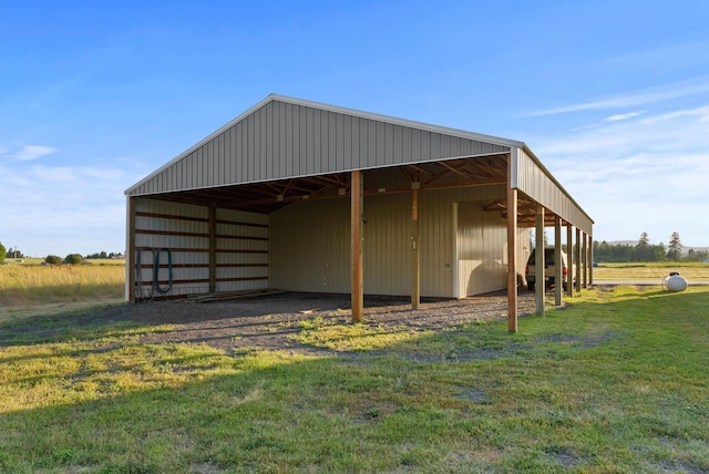 37818 N Grove Rd, Deer Park, WA 99006 - view of pole building featuring a yard and a carport