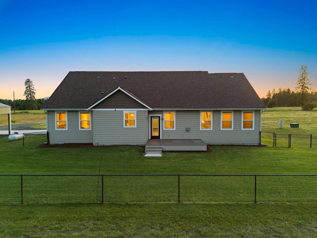 37818 N Grove Rd, Deer Park, WA 99006 - back of property with a wooden deck, a fenced backyard, and roof with shingles