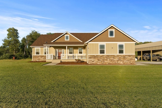 37818 N Grove Rd, Deer Park, WA 99006 - craftsman-style home with stone siding, covered porch, a front yard, and a shingled roof