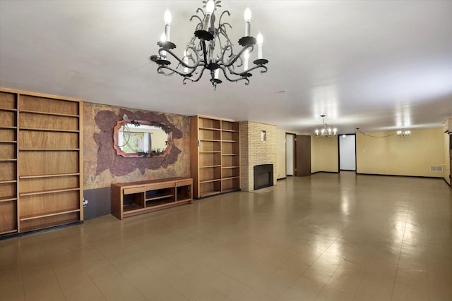 1102 S Buena Vista Dr, Spokane, WA 99224 - unfurnished living room featuring a chandelier, a brick fireplace, and built in features