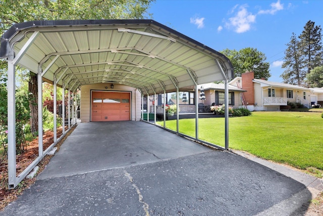 1102 S Buena Vista Dr, Spokane, WA 99224 - view of parking featuring asphalt driveway and a garage