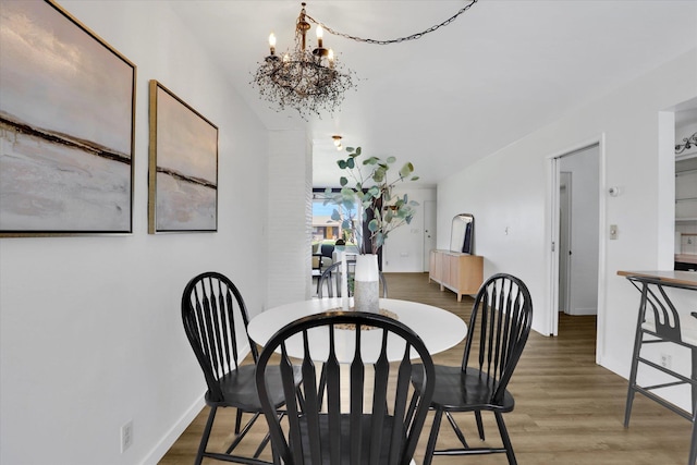 1102 S Buena Vista Dr, Spokane, WA 99224 - dining room with a chandelier and wood finished floors