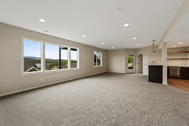 5206 S Willamette St, Spokane, WA 99223 - unfurnished living room with carpet and recessed lighting