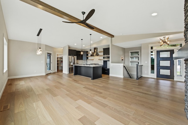 5206 S Willamette St, Spokane, WA 99223 - unfurnished living room featuring light wood finished floors, healthy amount of natural light, ceiling fan, recessed lighting, and a chandelier