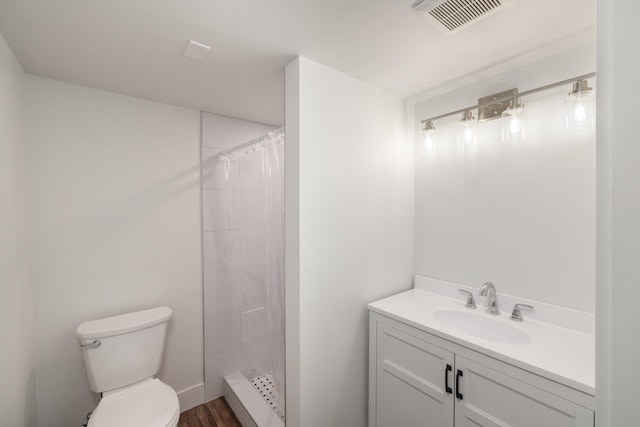 505 S University Rd, Spokane Valley, WA 99206 - bathroom featuring vanity, curtained shower, and wood finished floors