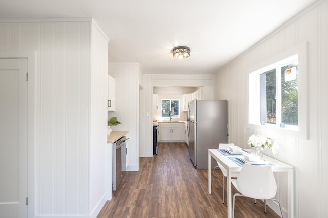 505 S University Rd, Spokane Valley, WA 99206 - kitchen featuring appliances with stainless steel finishes, dark wood-style flooring, light countertops, and white cabinets