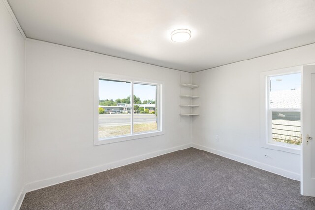 505 S University Rd, Spokane Valley, WA 99206 - unfurnished room featuring dark carpet and baseboards