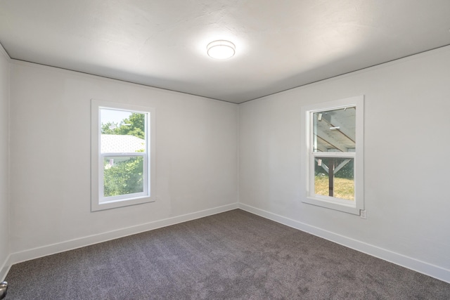 505 S University Rd, Spokane Valley, WA 99206 - unfurnished room with dark colored carpet and baseboards