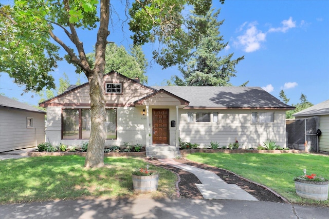 1310 N Woodruff Rd, Spokane Valley, WA 99206 - view of front of home with a front lawn