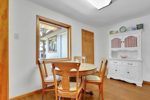 1310 N Woodruff Rd, Spokane Valley, WA 99206 - dining room with baseboards and light wood-style flooring