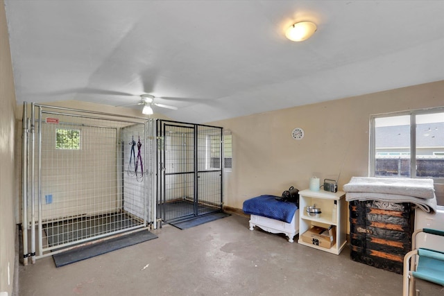 1310 N Woodruff Rd, Spokane Valley, WA 99206 - misc room with ceiling fan, concrete flooring, plenty of natural light, and lofted ceiling