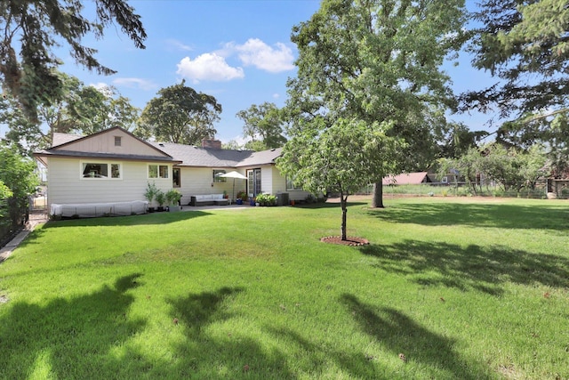 1310 N Woodruff Rd, Spokane Valley, WA 99206 - view of yard with a patio
