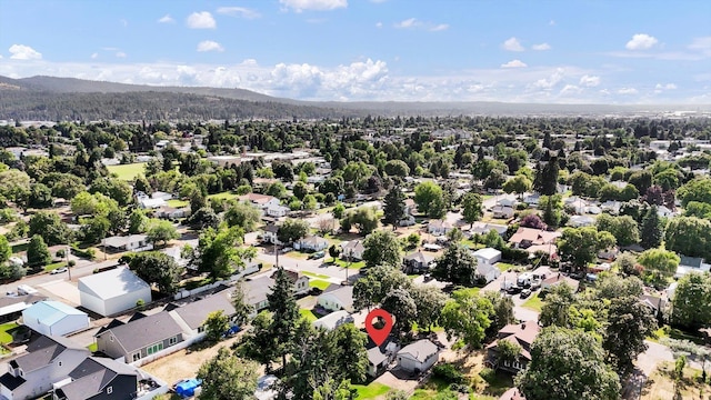 1310 N Woodruff Rd, Spokane Valley, WA 99206 - aerial perspective of suburban area featuring a mountainous background