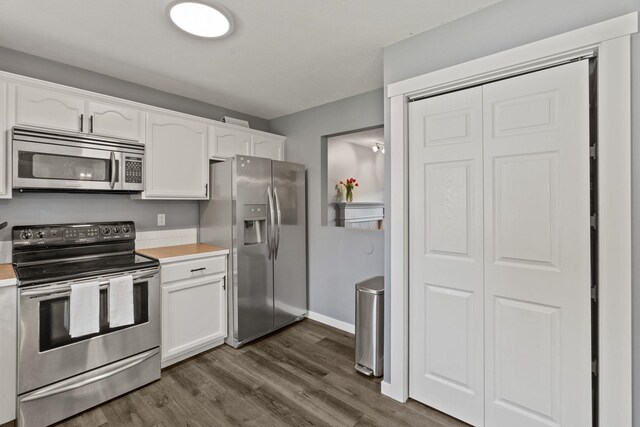 5214 S Myrtle Ln, Spokane, WA 99223 - kitchen featuring appliances with stainless steel finishes, white cabinetry, and light countertops