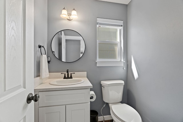 5214 S Myrtle Ln, Spokane, WA 99223 - half bathroom featuring vanity and toilet