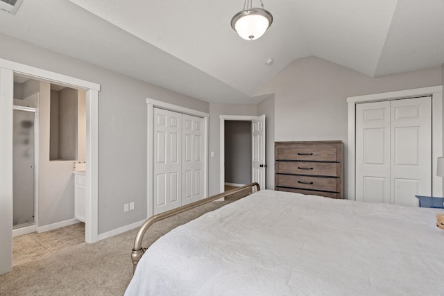 5214 S Myrtle Ln, Spokane, WA 99223 - bedroom with vaulted ceiling, carpet, ensuite bath, and multiple closets