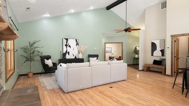 38415 N Hatch Rd, Deer Park, WA 99006 - living room featuring wood finished floors, beamed ceiling, high vaulted ceiling, and ceiling fan