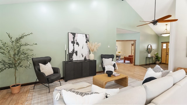 38415 N Hatch Rd, Deer Park, WA 99006 - living area featuring wood finished floors, high vaulted ceiling, and a ceiling fan