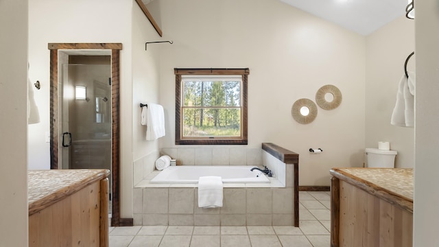38415 N Hatch Rd, Deer Park, WA 99006 - bathroom featuring a bath, a shower stall, tile patterned flooring, vanity, and lofted ceiling