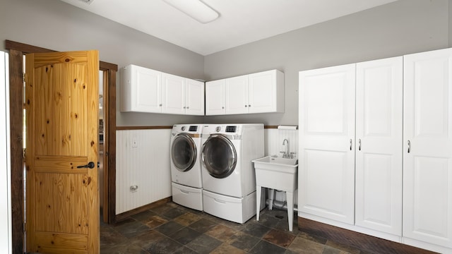 38415 N Hatch Rd, Deer Park, WA 99006 - washroom featuring independent washer and dryer, cabinet space, and stone finish floors