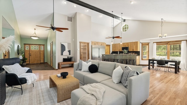 38415 N Hatch Rd, Deer Park, WA 99006 - living room with a ceiling fan, high vaulted ceiling, light wood finished floors, beamed ceiling, and recessed lighting