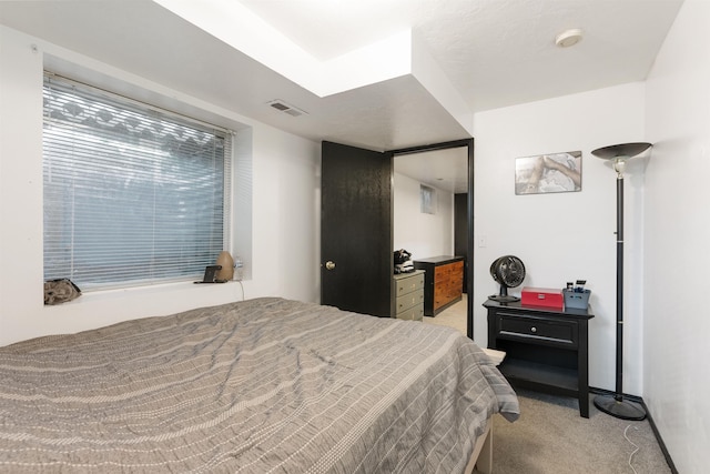 2624 E Boone Ave, Spokane, WA 99202 - bedroom with light carpet and baseboards