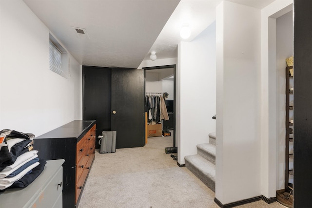 2624 E Boone Ave, Spokane, WA 99202 - hallway featuring light carpet and stairway