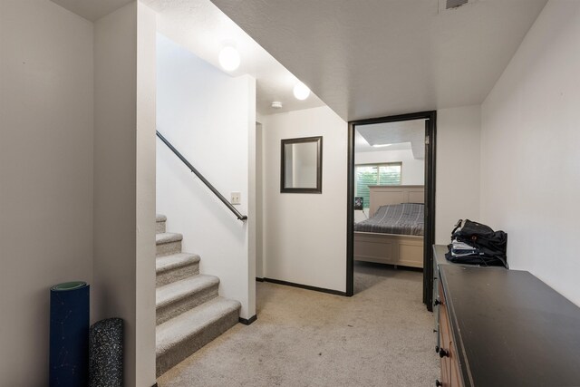 2624 E Boone Ave, Spokane, WA 99202 - stairs with carpet flooring and baseboards