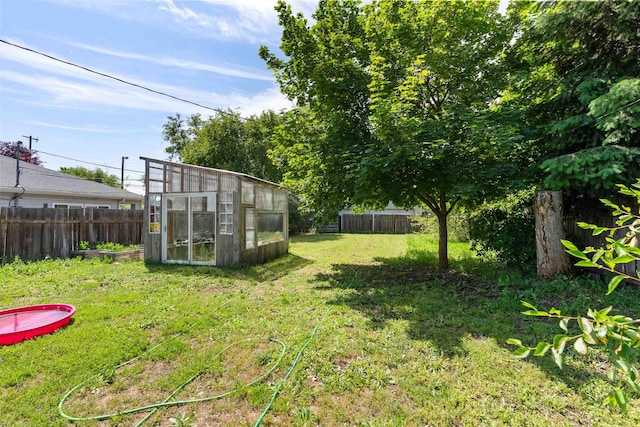 2624 E Boone Ave, Spokane, WA 99202 - fenced backyard featuring an exterior structure and an outbuilding