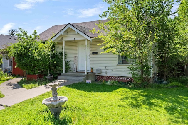 2624 E Boone Ave, Spokane, WA 99202 - bungalow-style home featuring a front lawn and roof with shingles