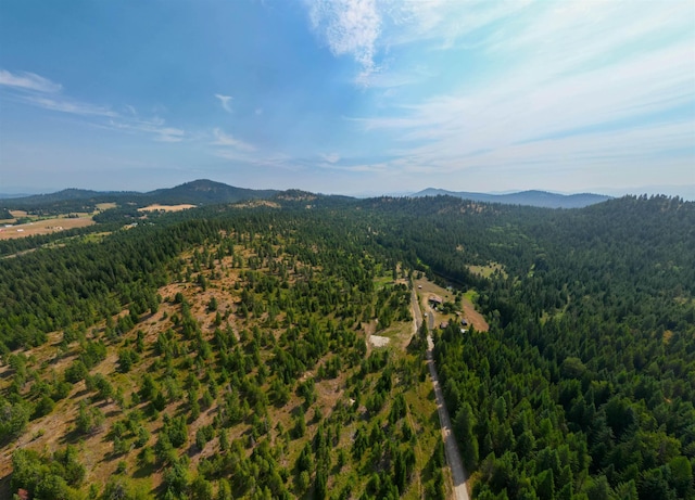 1301 S Roberts Rd, Newport, WA 99156 - bird's eye view of a heavily wooded area and a mountain backdrop