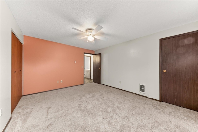 2121 E Upriver Dr Unit # 61, Spokane, WA 99207 - empty room with carpet and a ceiling fan