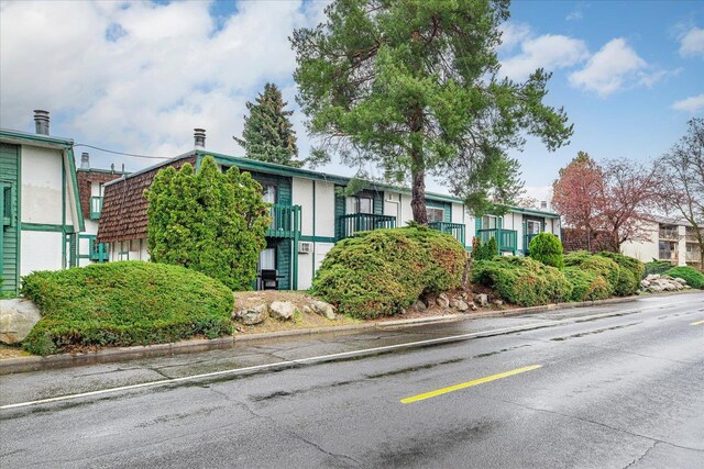 2121 E Upriver Dr Unit # 61, Spokane, WA 99207 - view of front of home featuring mansard roof