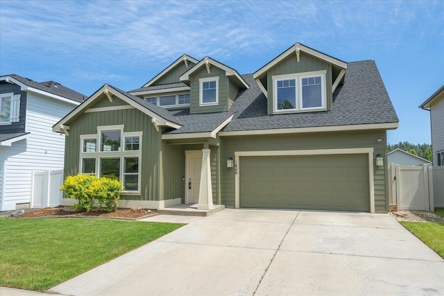 1840 N Wolfe Penn St, Liberty Lake, WA 99019 - craftsman inspired home with a shingled roof, driveway, a garage, and board and batten siding