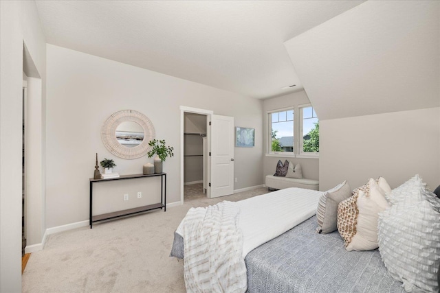 1840 N Wolfe Penn St, Liberty Lake, WA 99019 - bedroom featuring a walk in closet and light colored carpet