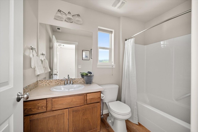 1840 N Wolfe Penn St, Liberty Lake, WA 99019 - bathroom with vanity, shower / tub combo with curtain, and wood finished floors