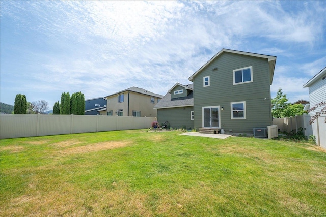 1840 N Wolfe Penn St, Liberty Lake, WA 99019 - rear view of house featuring a fenced backyard, entry steps, and a patio