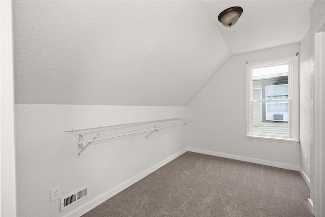 215 E 18th Ave, Spokane, WA 99203 - additional living space with vaulted ceiling and dark colored carpet