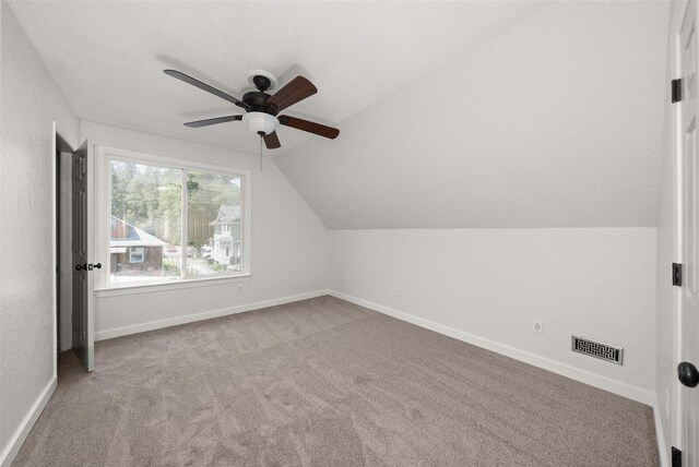 215 E 18th Ave, Spokane, WA 99203 - additional living space with a ceiling fan, vaulted ceiling, and carpet floors