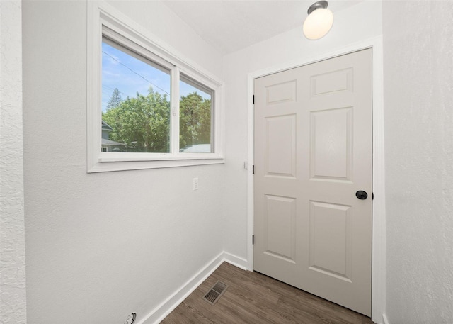 215 E 18th Ave, Spokane, WA 99203 - doorway with dark wood-style floors and baseboards