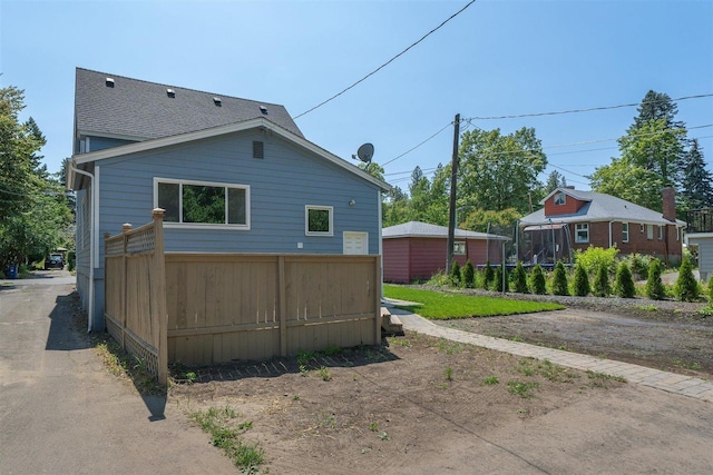 215 E 18th Ave, Spokane, WA 99203 - view of home's exterior featuring a shingled roof