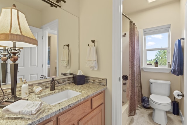 6815 S Palouse Hwy, Spokane, WA 99223 - bathroom featuring vanity, backsplash, and shower / tub combo with curtain