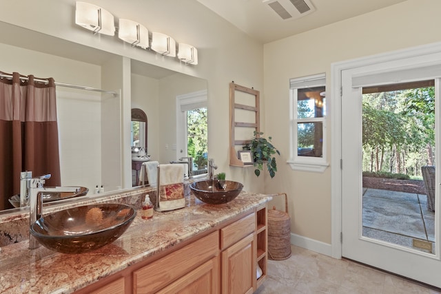 6815 S Palouse Hwy, Spokane, WA 99223 - full bath with curtained shower and double vanity