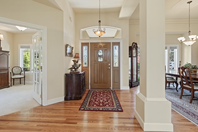 6815 S Palouse Hwy, Spokane, WA 99223 - entryway featuring a chandelier and light wood-style floors
