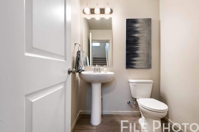 14 N Drummond St, Spokane Valley, WA 99016 - half bath with toilet and wood finished floors